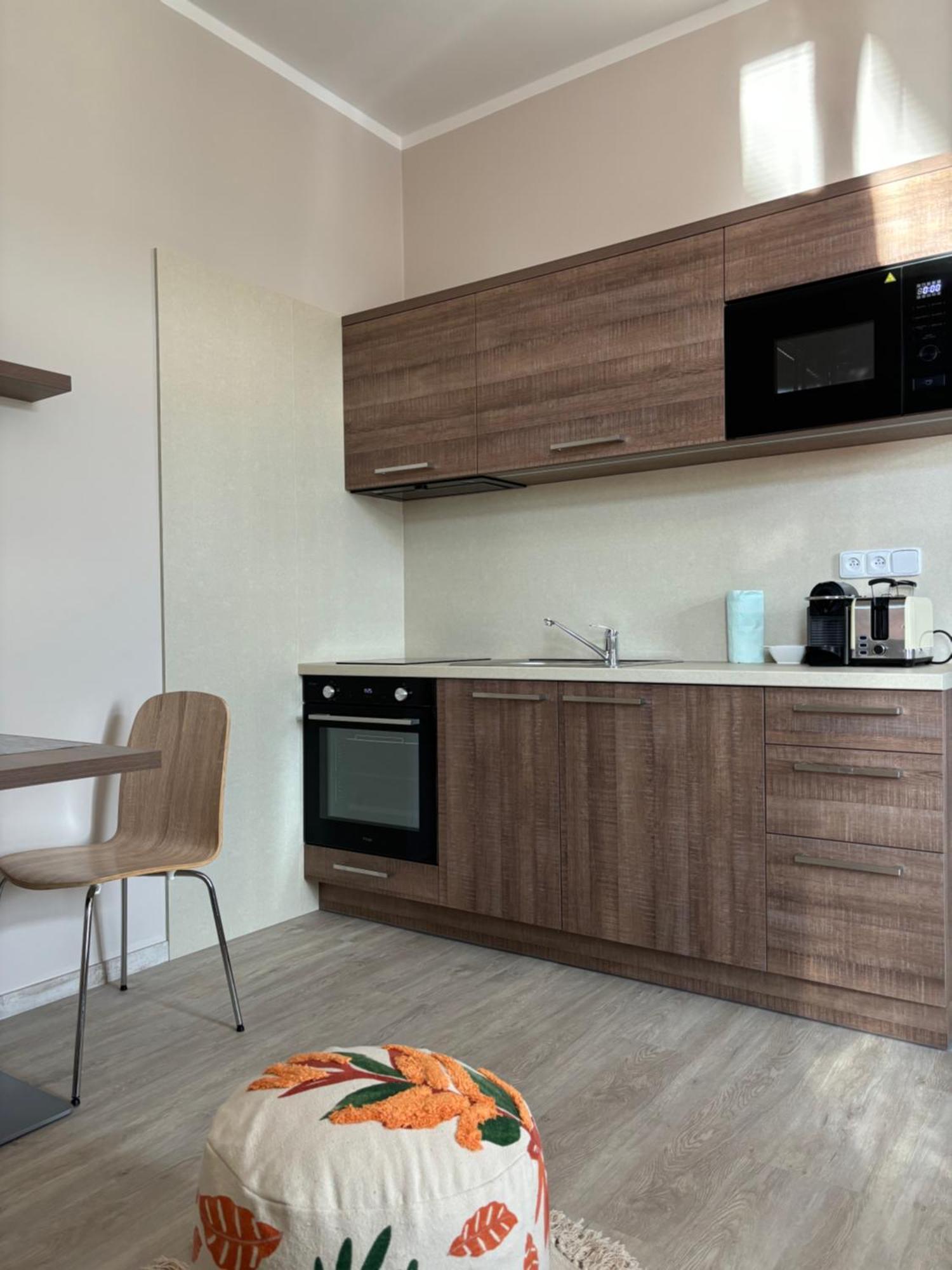 Penzion Apartmany Resident ปอดเยบราดิ ภายนอก รูปภาพ
