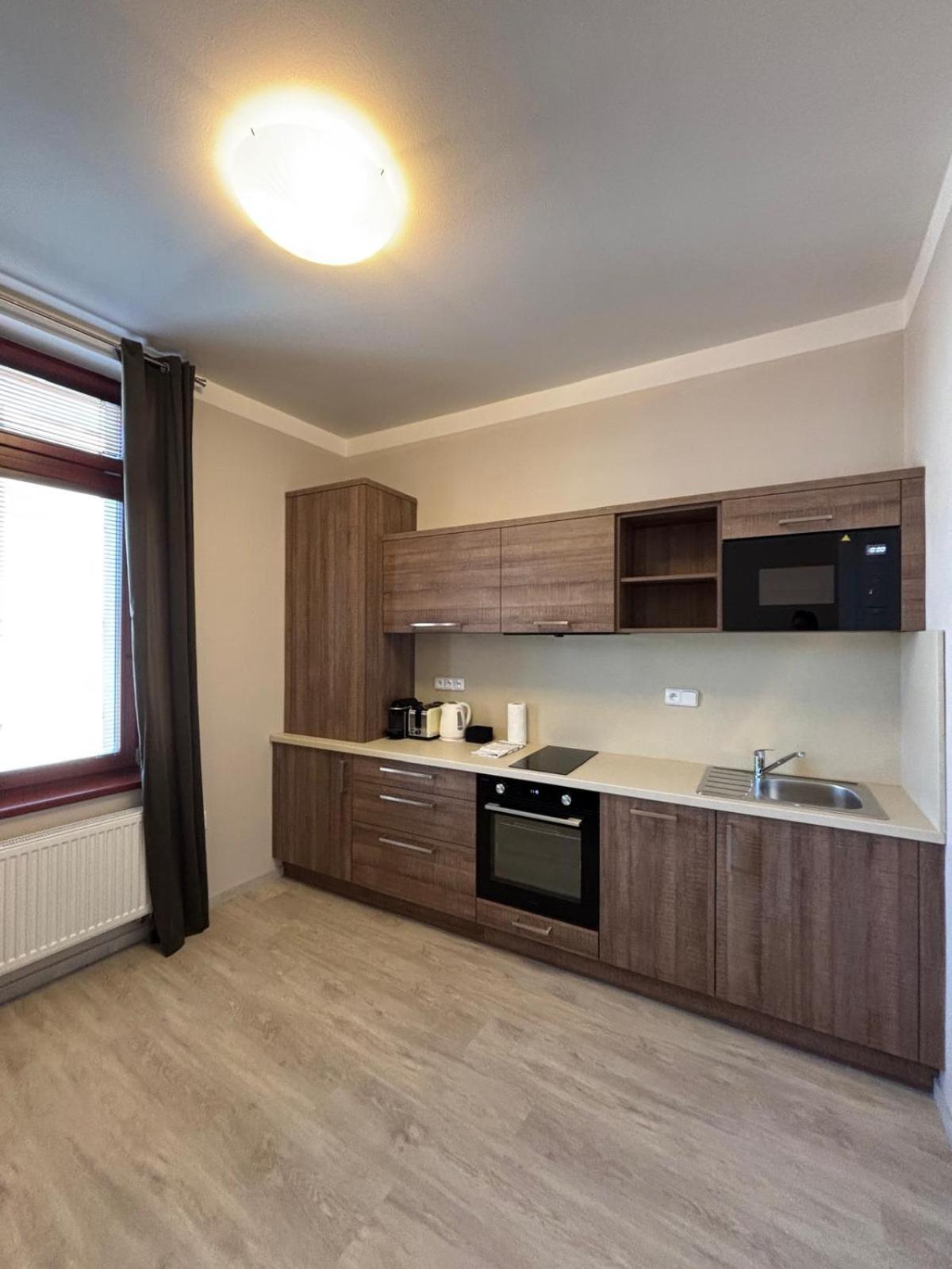 Penzion Apartmany Resident ปอดเยบราดิ ภายนอก รูปภาพ